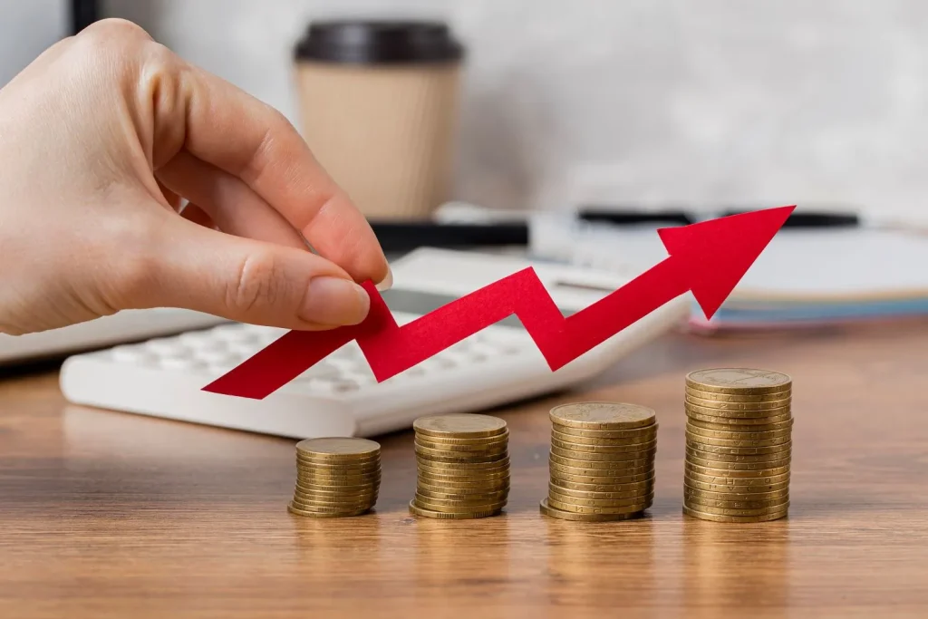 finalexpensequoter.com hand holding growth arrow with coins