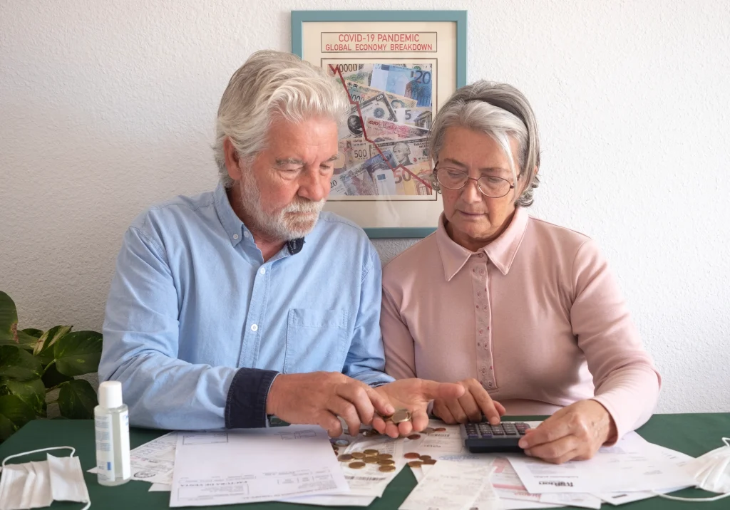 finalexpensequoter.com senior couple counting money table home
